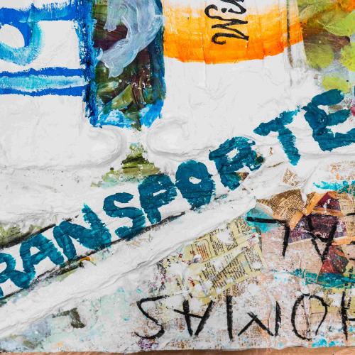 The word Transported painted across a background with different images