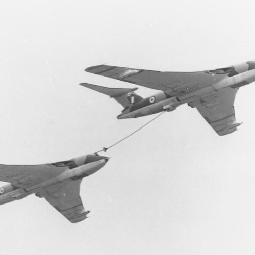 A Victor Tanker refuelling another aircraft mid-air. 