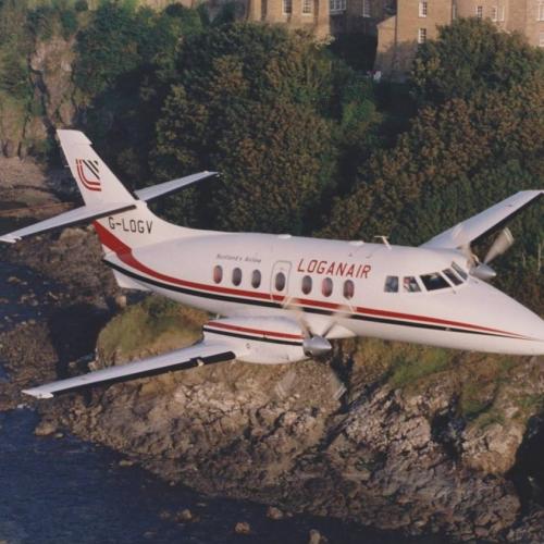 A LoganAir Jetstream flying over the coast in the 1970s 