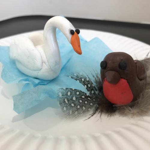 colourful clay model swan and robin
