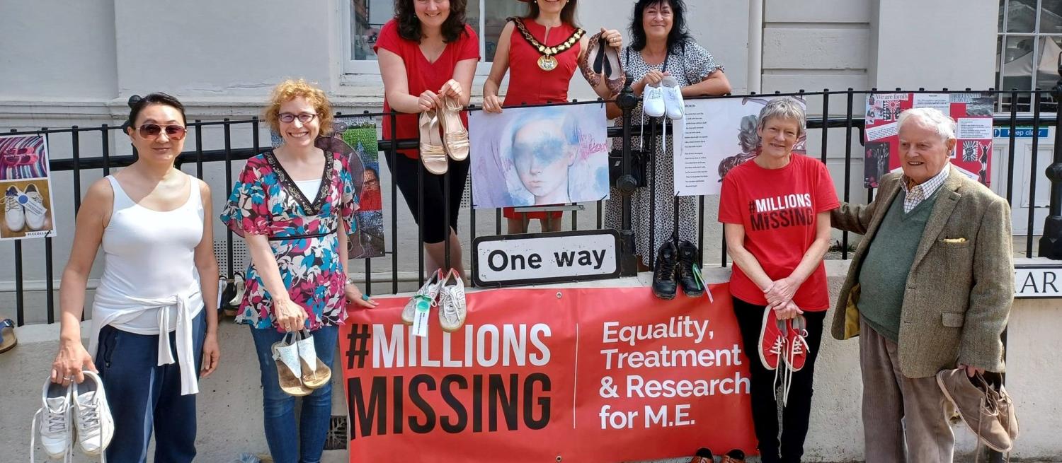 Colour photograph of a group of members of the ME/CFS group outside of St Albans Museum and Gallery