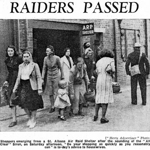 Feature from the Herts Advertiser showing shoppers emerging from an Air Raid Shelter in St Albans after hearing the All Clear siren
