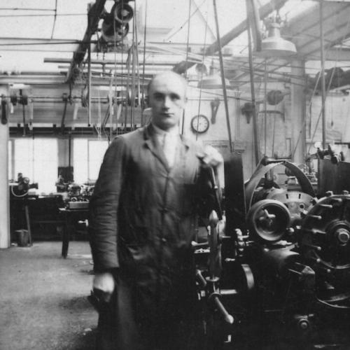 Black & white photographic print showing a man working at Mercer’s in St Albans, possibly Harold Scott. 1.1 Test 10.1 10.2 10.3 SADC
