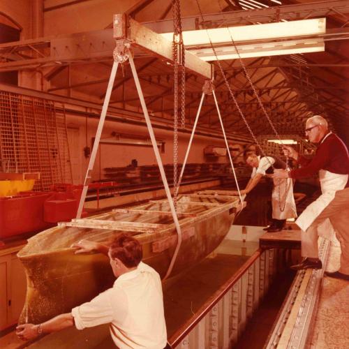The models used in the tank were around five metres long. Here, one of them is being floated in the tank ahead of testing. © Valerie Moor.