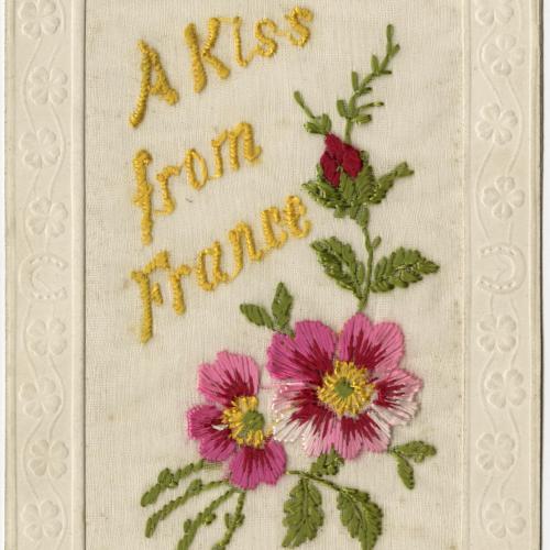 Embroidered Post Card bearing the motto "A Kiss from France" with floral motif