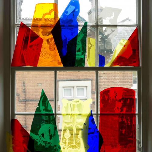 Translucent coloured filter pieces surimposed onto gallery window