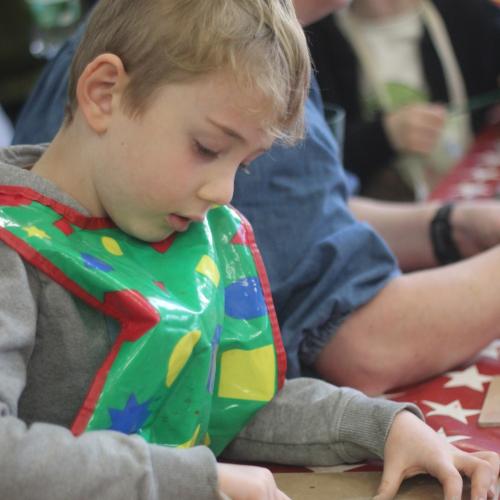 child playing with clay