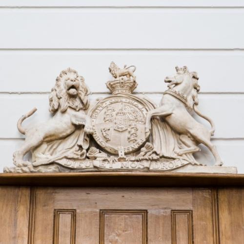 Close-up of the crest in the courtroom in St Albans Museum + Gallery