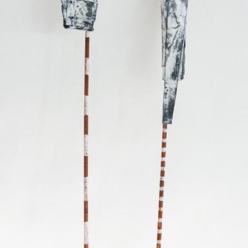 Markerland II, two sticks painted with coloured stripes with paper tied around their ends