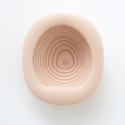 Intimacy Package, concave sculpture with concentric circles made of soft materials, facing front
