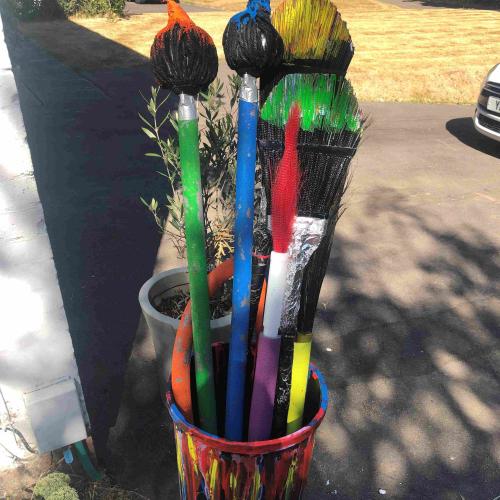 Giant paint pot and brushes made as a joint artwork