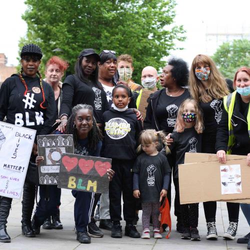 A group of Black Lives Matter protesters including children 