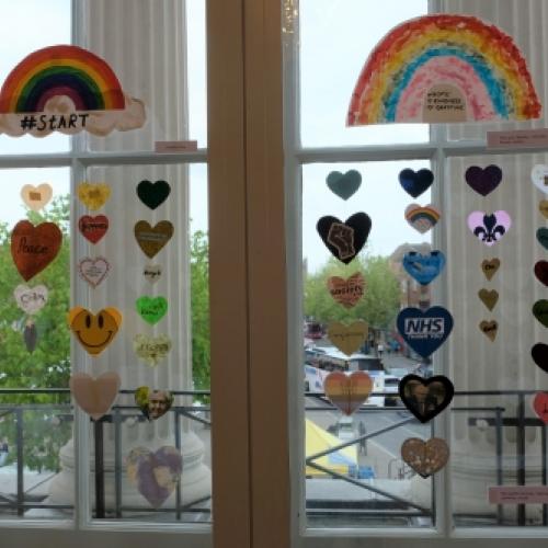 Hearts from the Rainbow Trail hanging in a window