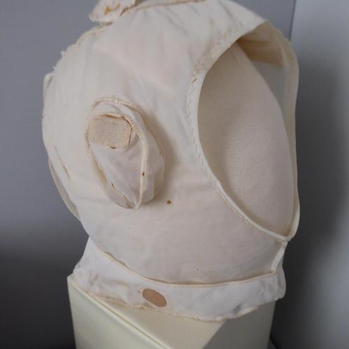 Photo of the inner helmet liner displayed on the mannequin head and displayed
