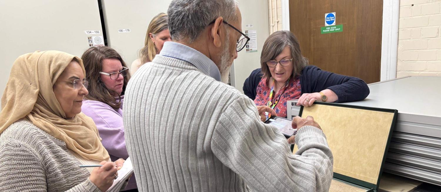 Group studying documents in an archive