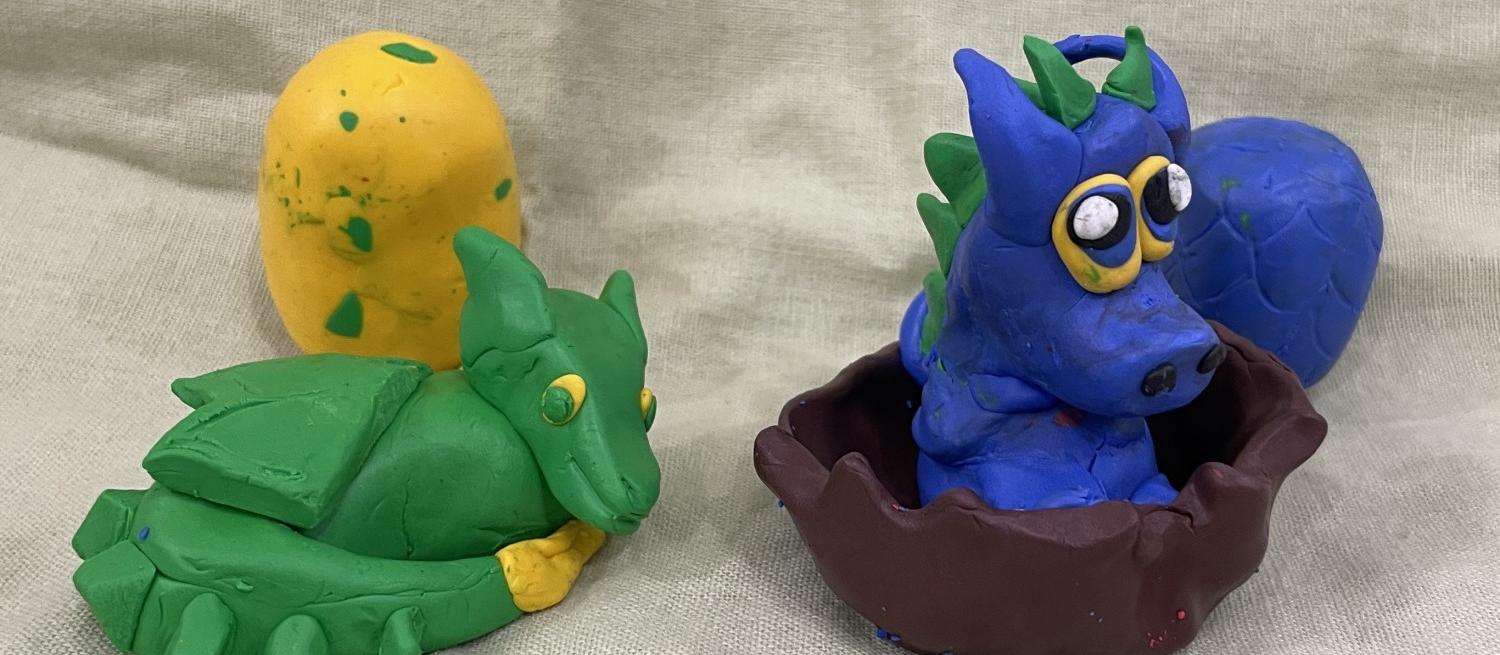 Colourful clay model dragons