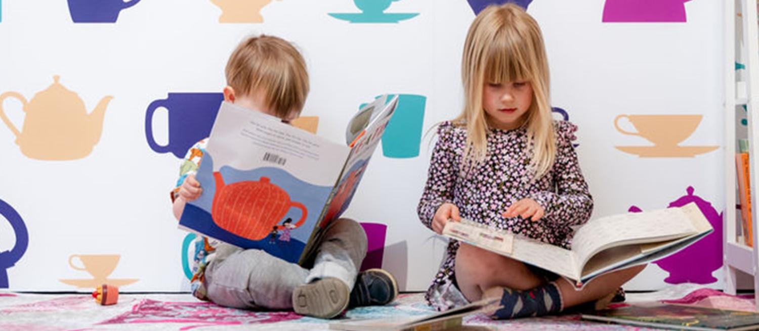 Children reading in Time For Tea