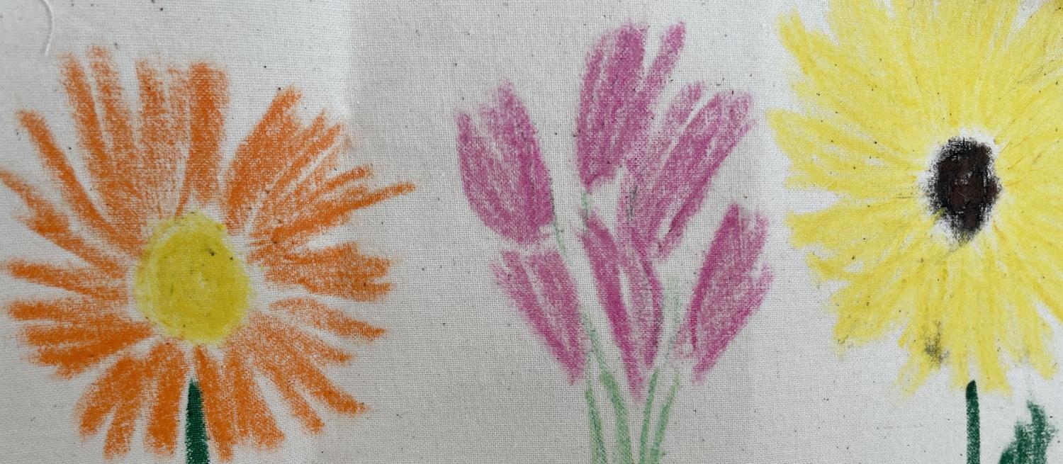 drawings of flowers using fabric crayons on cloth