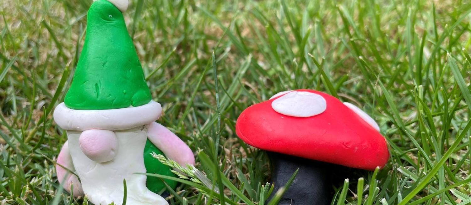 green gnome and toadstool