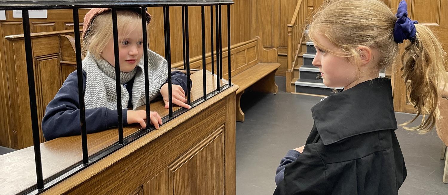 children's role play in historic courtroom