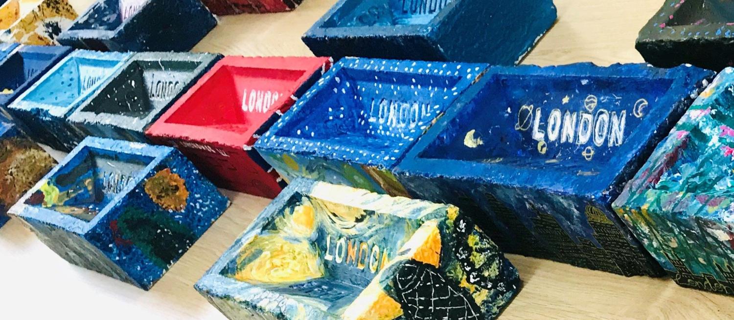 Painted bricks arranged in a wall pattern