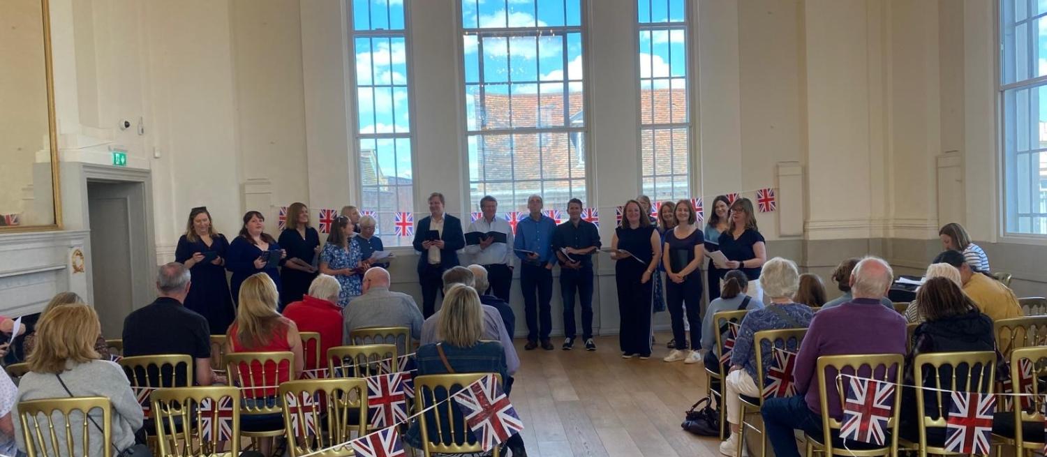 The Monday Choir singing in the Assembly Room