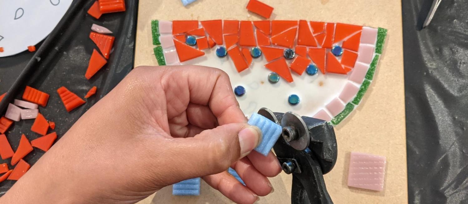 someone making a watermelon mosaic