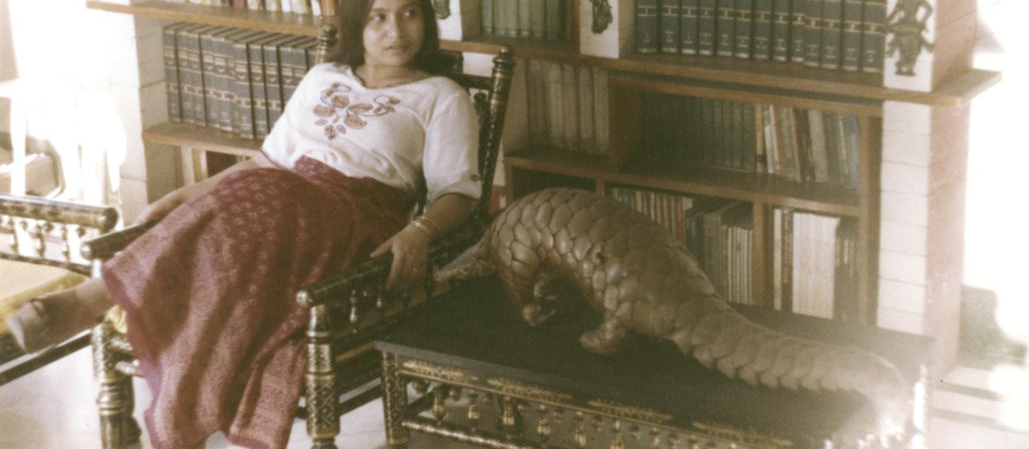 Bandana at home in Kolkata with stuffed anteater, which used to be a family pet.