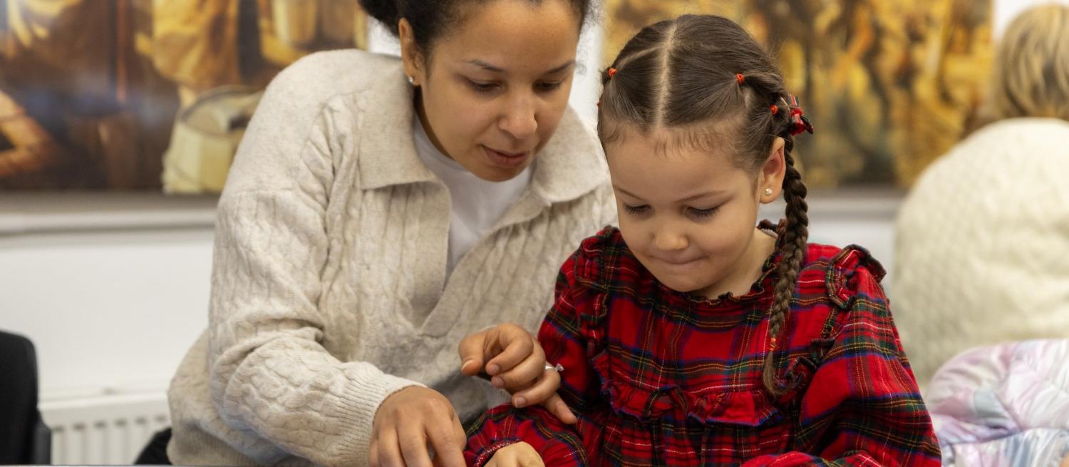 Family enjoying craft workshop