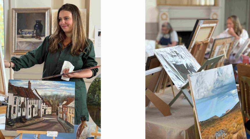 Photograph of artist at easel and paintings on an easel at last year's event