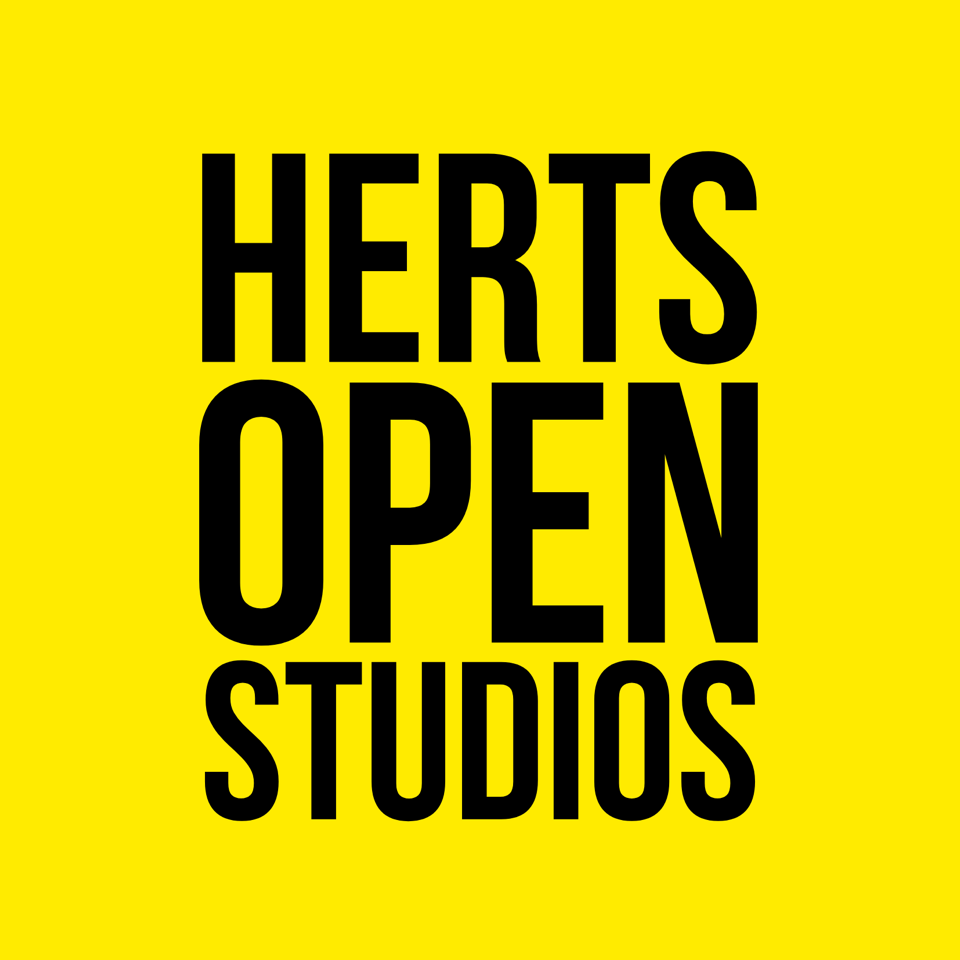 Herts Open Studios written in black on a yellow background