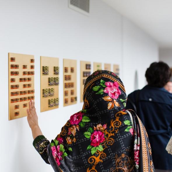 Visitor exploring an exhibition