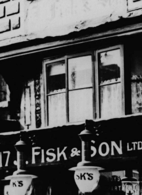 Monochrome photographic print showing Fisk & Son’s shop at 17 High Street, St Albans