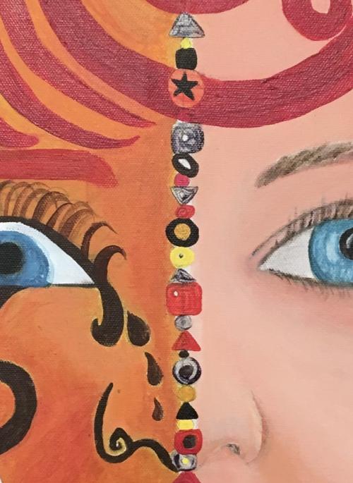 Detail from a painting of a face divided in two