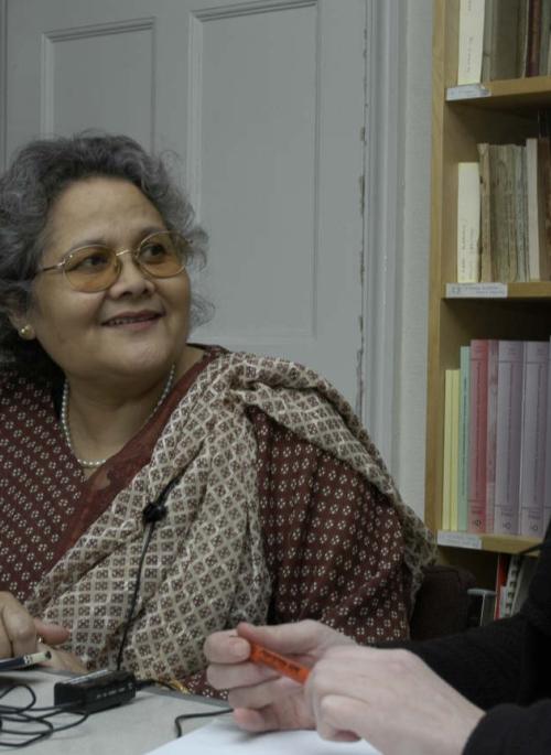 photographic image of two  women, one is interviewing the other 