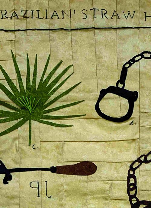 Applique and hand embroidered textile artwork with a quilted background in sepia tones and images of a palm leaf and violent tools of enslavement layered on top