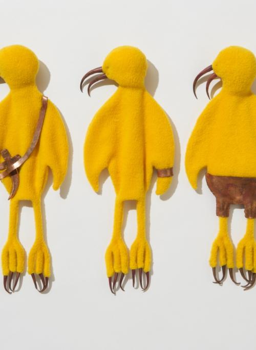 Yellow birds made from fabric and copper