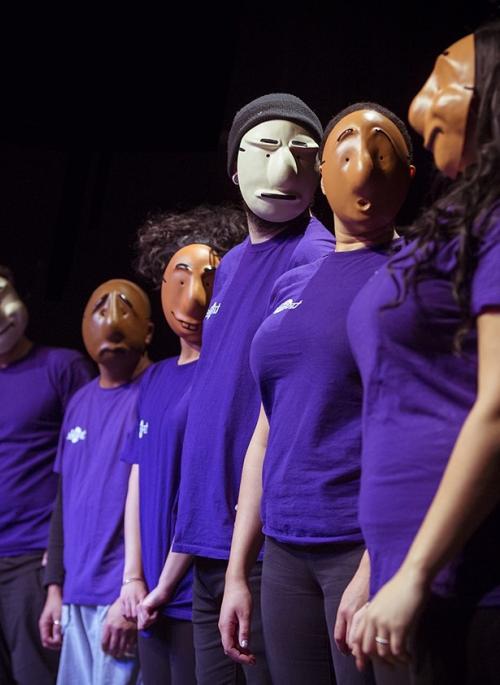 Members of Trestle Theatre Company wearing the Trestle masks