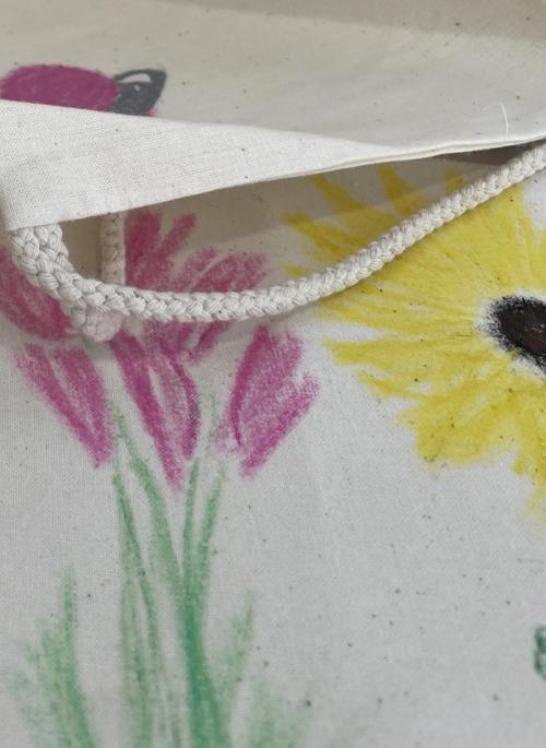 drawings of flowers using fabric crayons on cloth