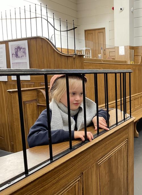 child role playing in Victorian courtroom