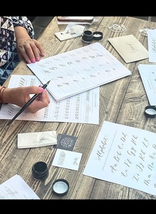 people doing calligraphy