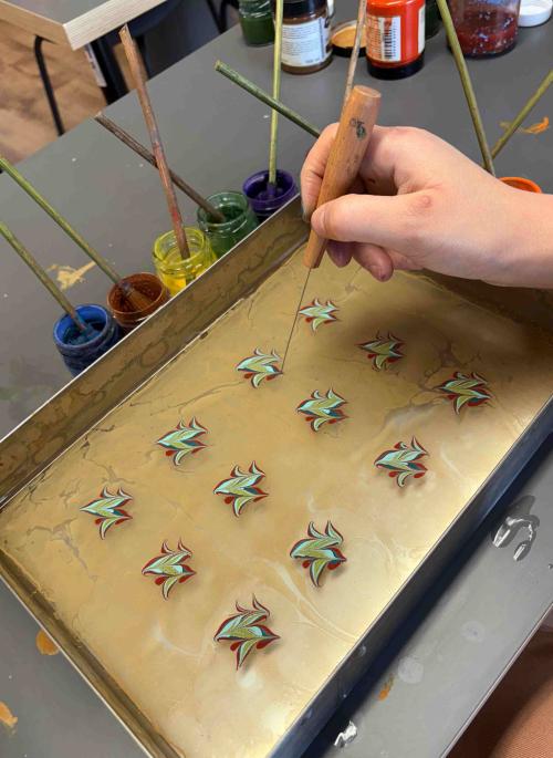 Someone water marbling