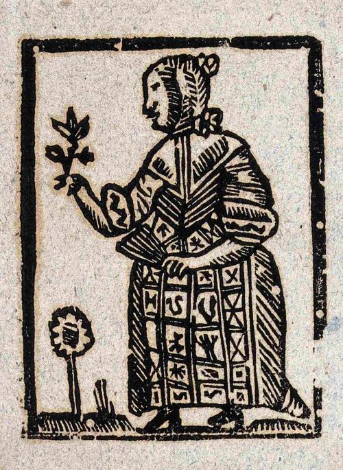 A witch holding a plant in one hand and a fan in the other. Woodcut, ca. 1700-1720